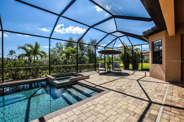 view of swimming pool with a patio, a lanai, and a pool with connected hot tub