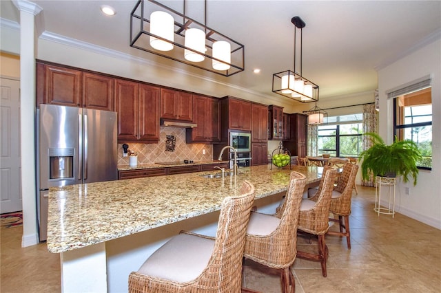 kitchen featuring a sink, stainless steel appliances, ornamental molding, and decorative backsplash