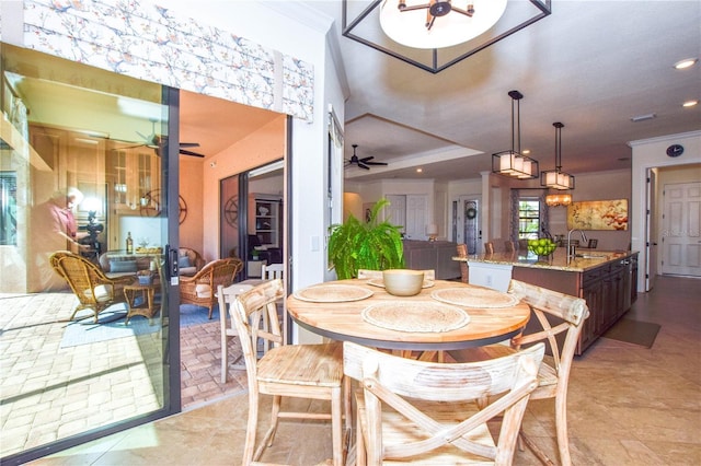 dining space featuring recessed lighting, a ceiling fan, and ornamental molding