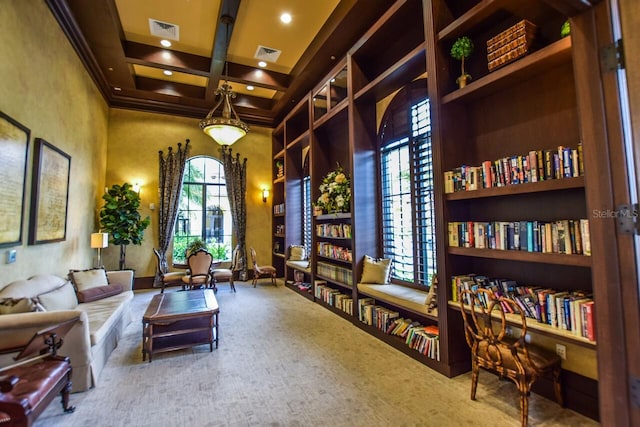 living area with visible vents, carpet floors, coffered ceiling, and beamed ceiling