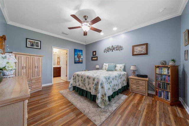 bedroom with wood finished floors, a ceiling fan, visible vents, baseboards, and ornamental molding