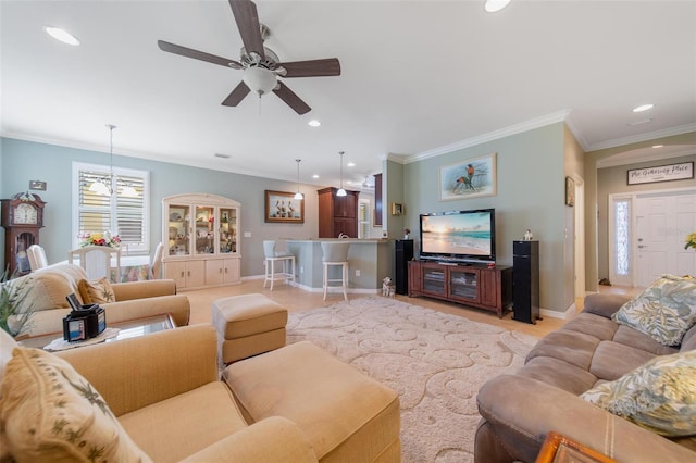 living room with a ceiling fan, recessed lighting, crown molding, and baseboards