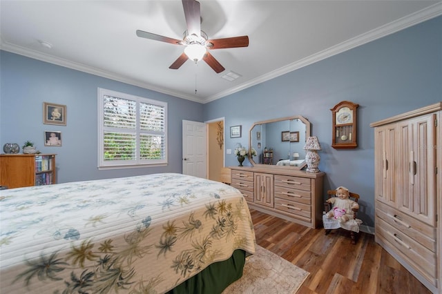 bedroom with dark wood-type flooring, visible vents, ornamental molding, and ceiling fan