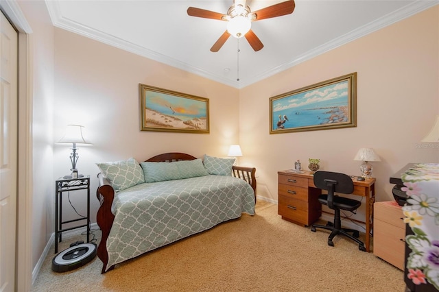 bedroom with carpet, a closet, crown molding, and baseboards