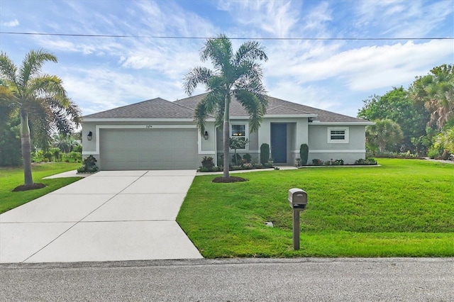 ranch-style home featuring a garage, driveway, a front yard, and stucco siding