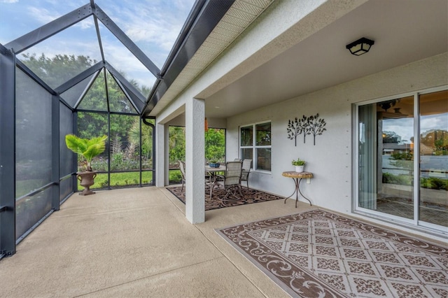 view of patio / terrace with a lanai