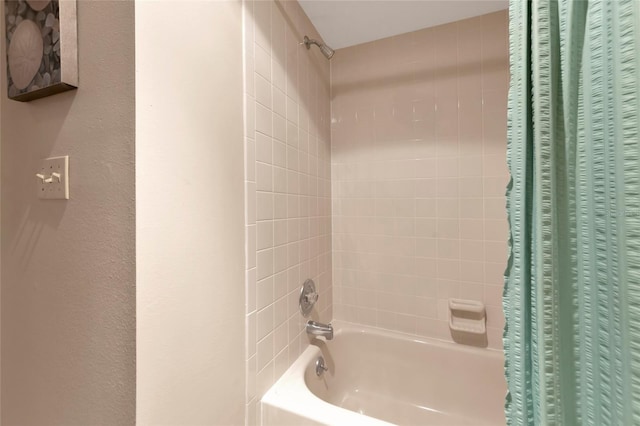 full bath with shower / bath combination with curtain