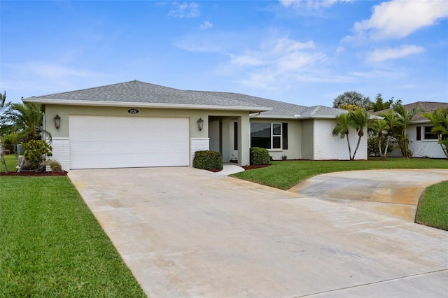single story home featuring brick siding, an attached garage, driveway, and a front yard