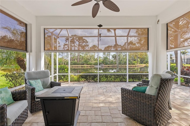 sunroom / solarium with ceiling fan