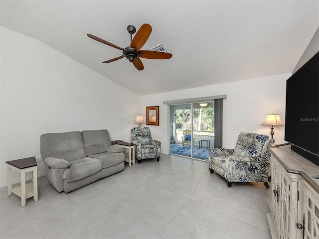 living room featuring lofted ceiling, visible vents, and ceiling fan