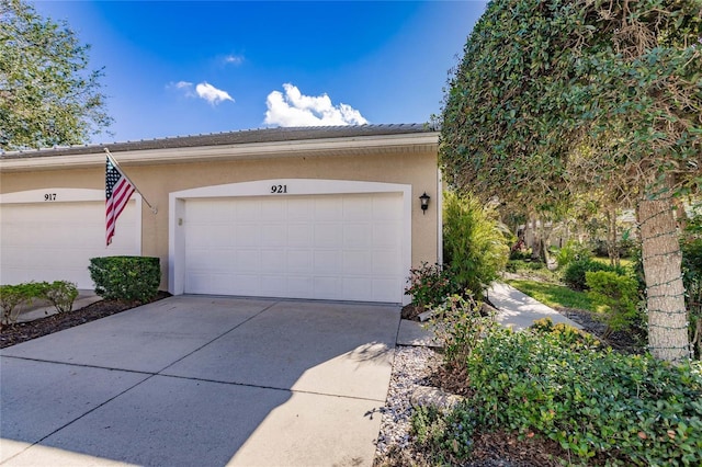 garage with driveway