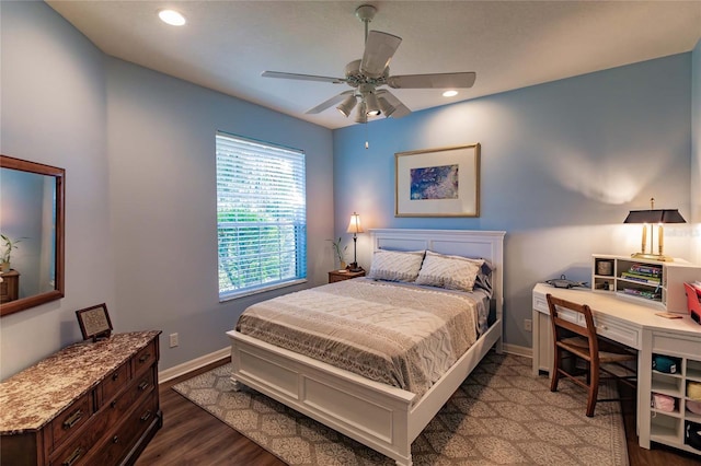 bedroom featuring dark wood-style floors, recessed lighting, a ceiling fan, and baseboards