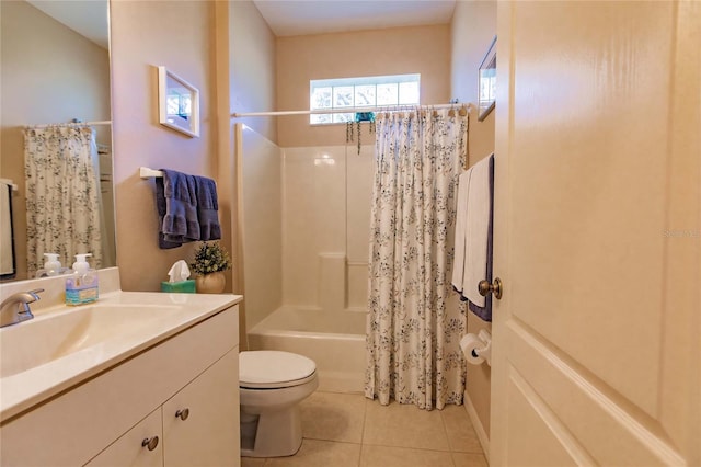 bathroom featuring tile patterned flooring, vanity, toilet, and shower / bath combo with shower curtain