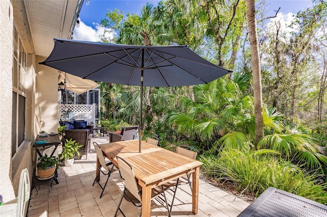 view of patio with outdoor dining space