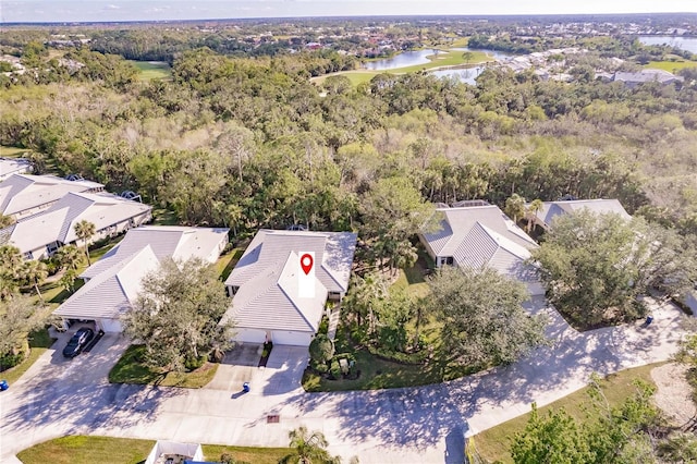 aerial view with a water view and a residential view