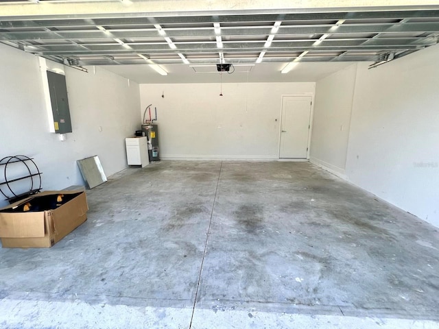 garage featuring water heater and electric panel