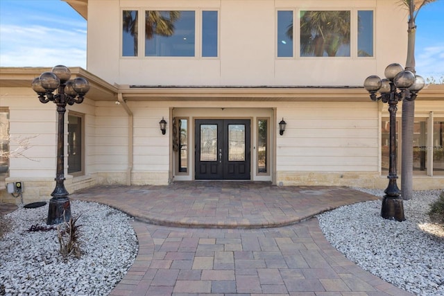 view of exterior entry with french doors