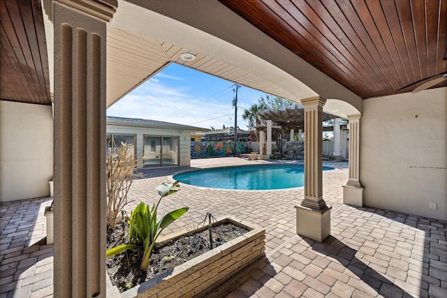 view of pool with a patio and a fenced in pool