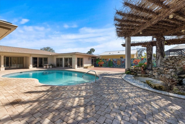 pool featuring a patio area