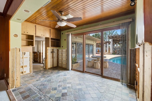 entryway with wooden ceiling and a ceiling fan