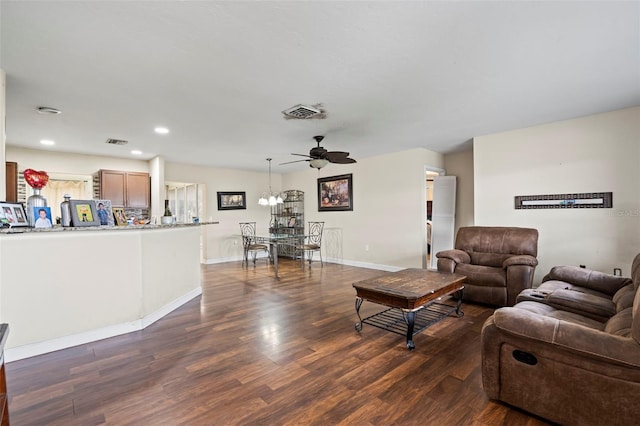 living room featuring recessed lighting, visible vents, a ceiling fan, baseboards, and dark wood-style floors