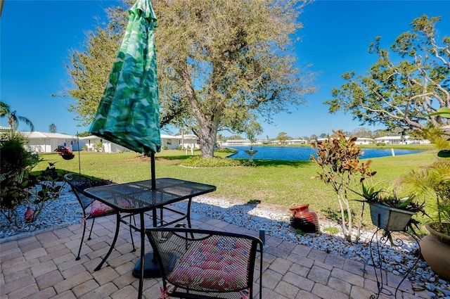 view of patio featuring a water view