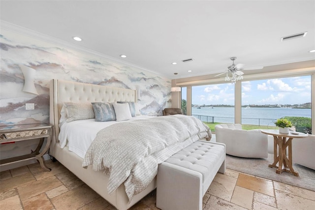 bedroom with recessed lighting, a water view, visible vents, stone tile flooring, and crown molding