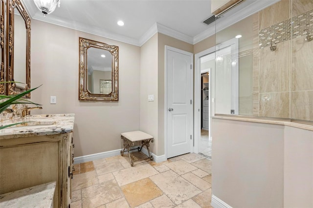 bathroom featuring stone tile floors, visible vents, baseboards, and crown molding