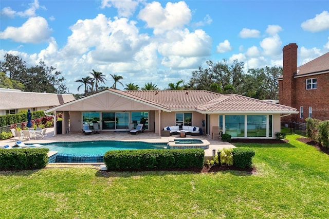 back of house with a patio, outdoor lounge area, fence, a yard, and a tiled roof