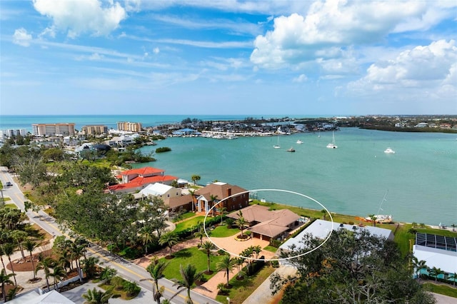 birds eye view of property featuring a water view