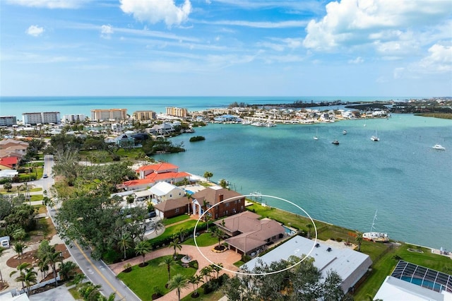 birds eye view of property featuring a water view