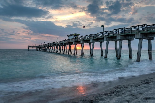 dock area featuring a pier and a water view