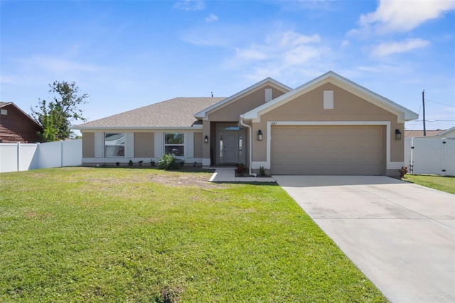 view of front of house featuring stucco siding, an attached garage, a front yard, fence, and driveway