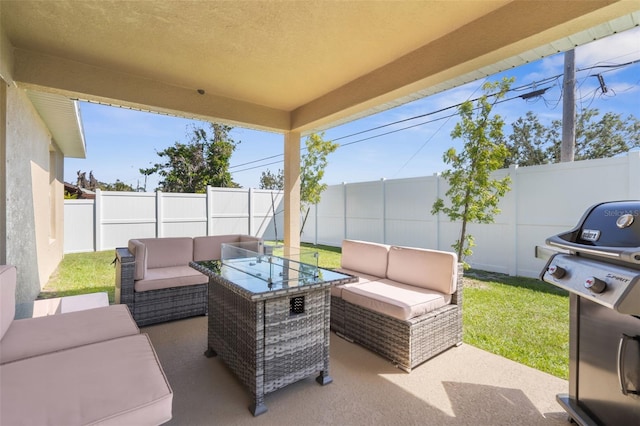 view of patio / terrace with a fenced backyard and an outdoor living space