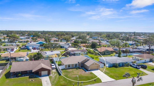 drone / aerial view with a residential view