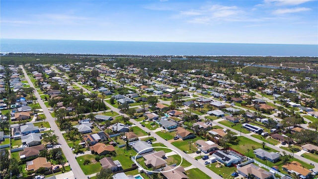 aerial view with a water view and a residential view