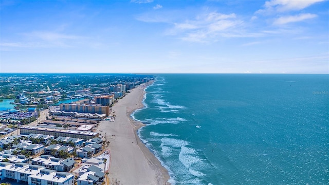 bird's eye view featuring a water view, a view of city, and a view of the beach