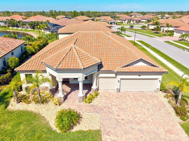 birds eye view of property with a residential view