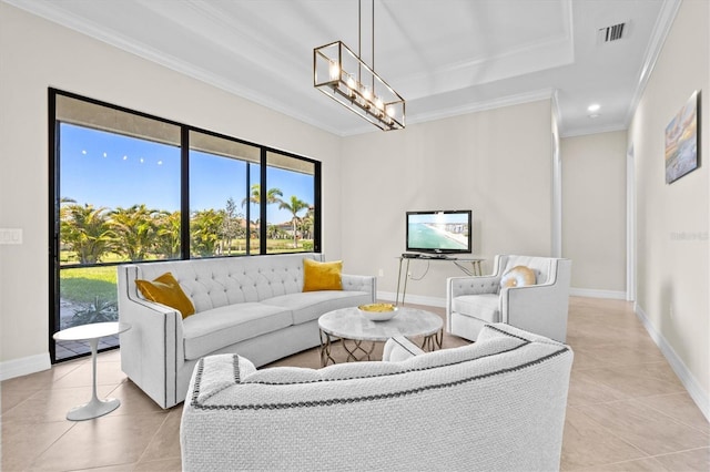 living area with light tile patterned floors, ornamental molding, visible vents, and baseboards