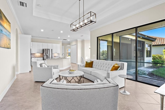 living room featuring light tile patterned floors, visible vents, and crown molding