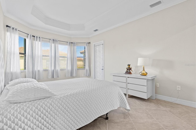 bedroom featuring a raised ceiling, visible vents, ornamental molding, light tile patterned flooring, and baseboards