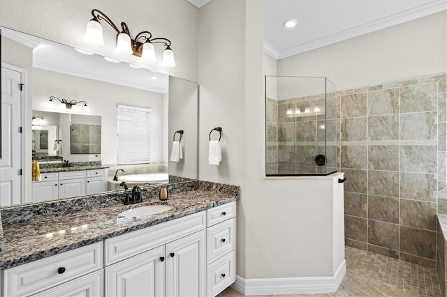 full bathroom featuring a washtub, walk in shower, vanity, and crown molding