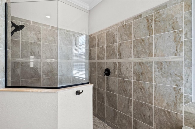 full bath with ornamental molding and a walk in shower