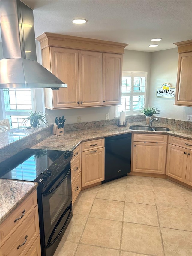 kitchen with extractor fan, light brown cabinets, black appliances, and a sink