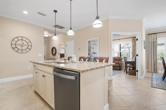 kitchen with visible vents, a sink, stainless steel dishwasher, and light tile patterned floors