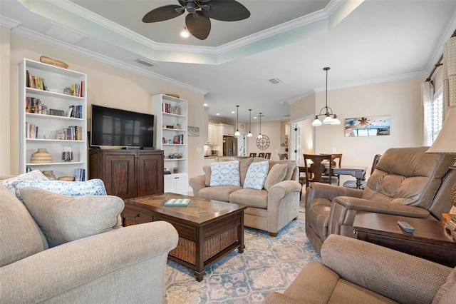 living room featuring crown molding, recessed lighting, a raised ceiling, visible vents, and a ceiling fan