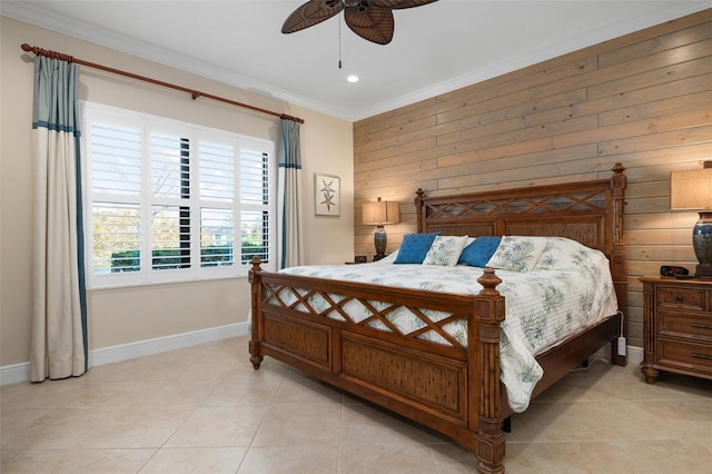 bedroom featuring light tile patterned floors, baseboards, ceiling fan, crown molding, and wood walls