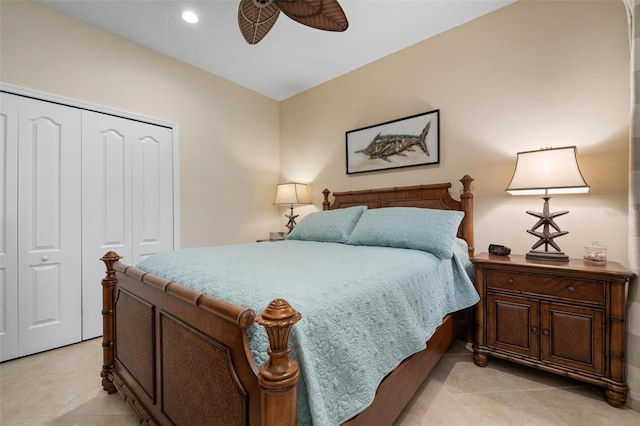 bedroom with light tile patterned floors, ceiling fan, a closet, and recessed lighting