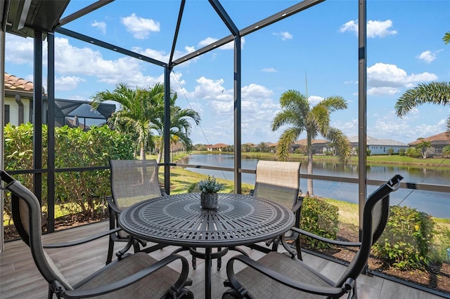 sunroom with a water view