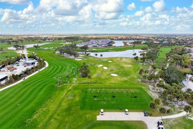 bird's eye view featuring a water view and golf course view